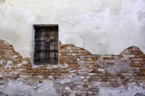 16154683-old-brick-and-stucco-wall